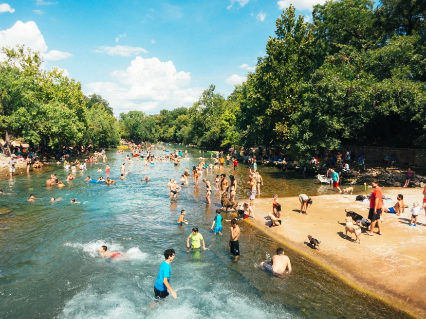 People swimming in a pool in Austin, Texas. 