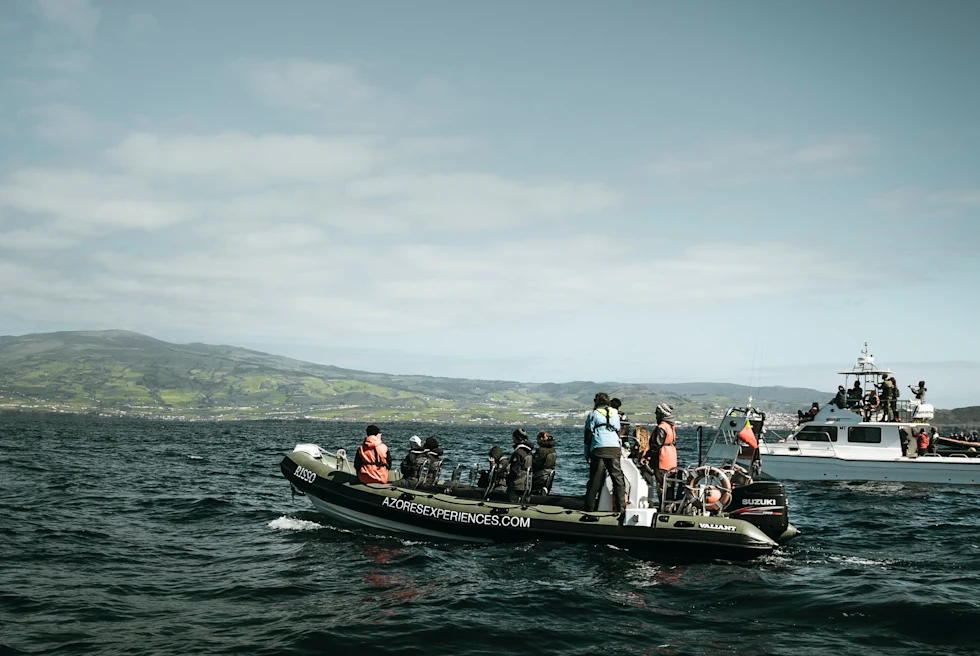 Two boats on water going to Pico island.