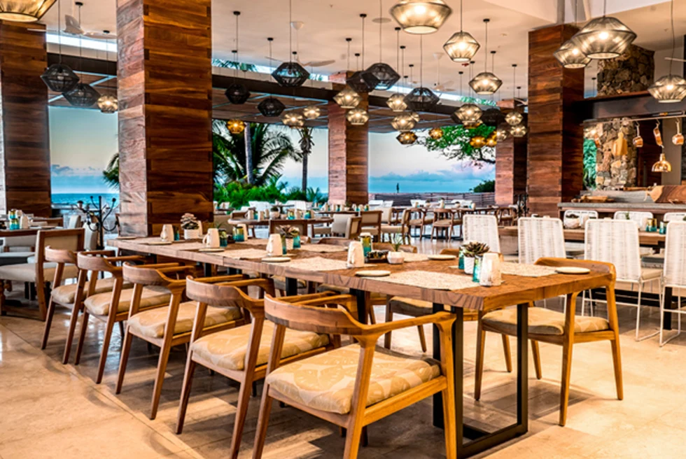 A Mexican restaurants with tasteful design, wooden chair and ocean views. 