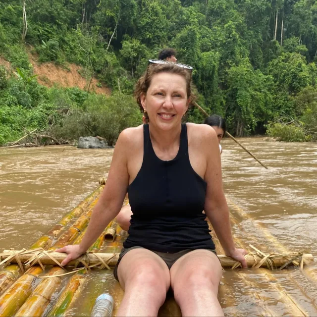 Travel Advisor Holly Raynes is on a water raft.