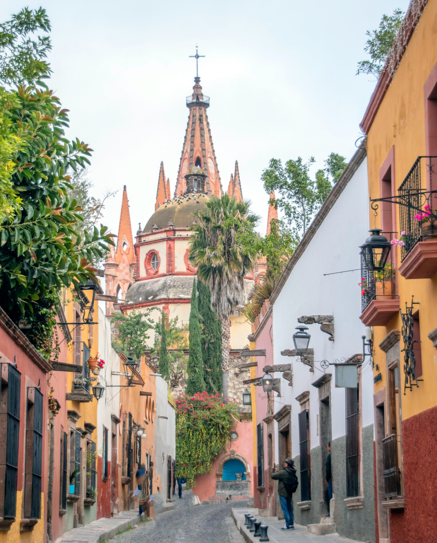 View of street, church and colorful buildings in San Miguel Allende