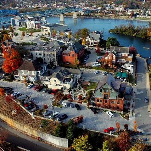 Aerial view of a town by the water during the daytime