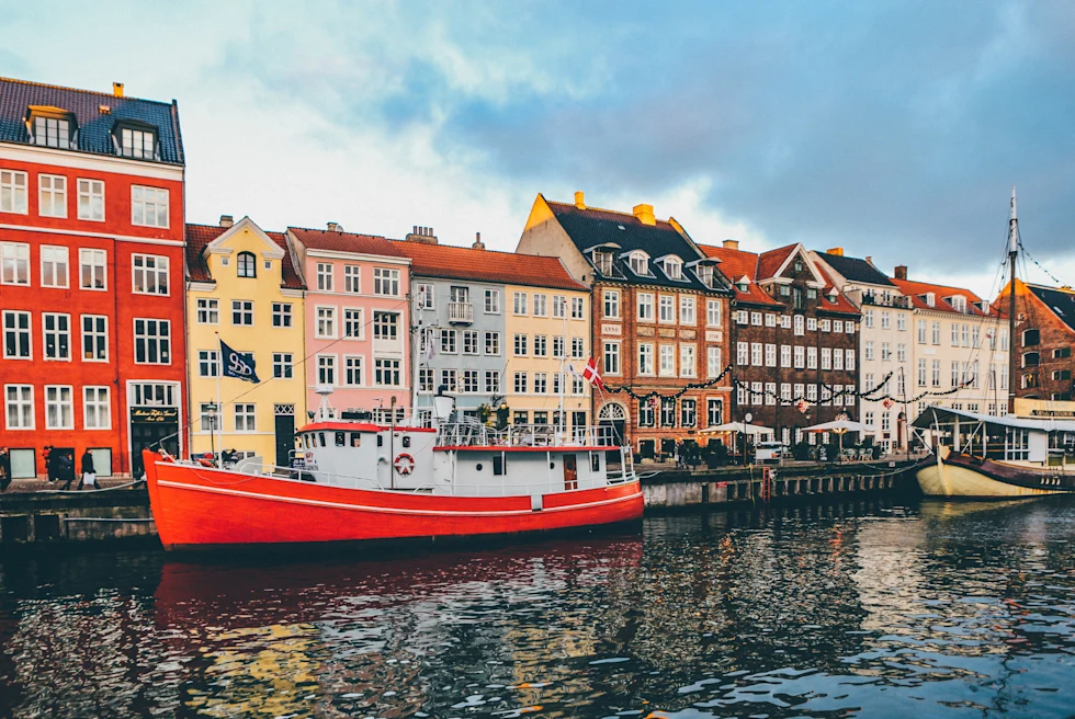 colorful buildings next to body of water during daytime