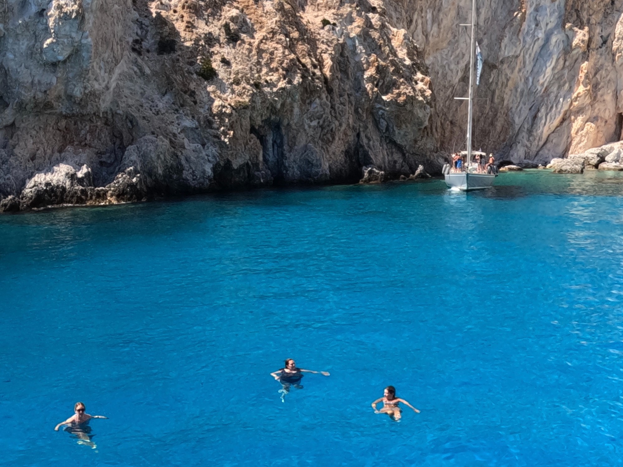 People swimming in a body of water. 