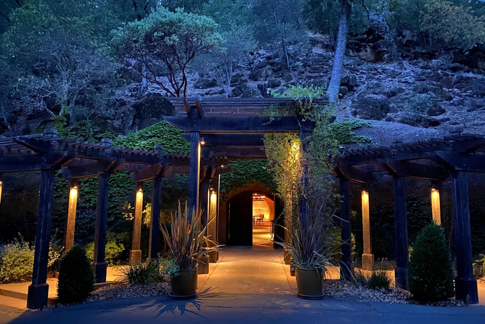 a wine cellar entrance underground lit up at night