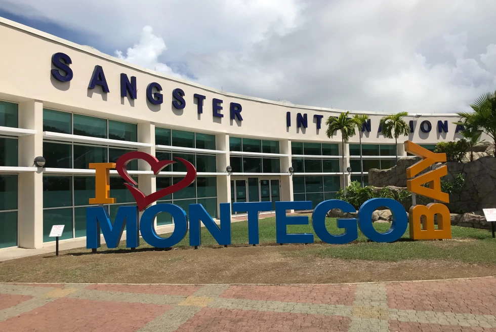 exterior of an airport with 3D sign that reads, I <3 Montego Bay