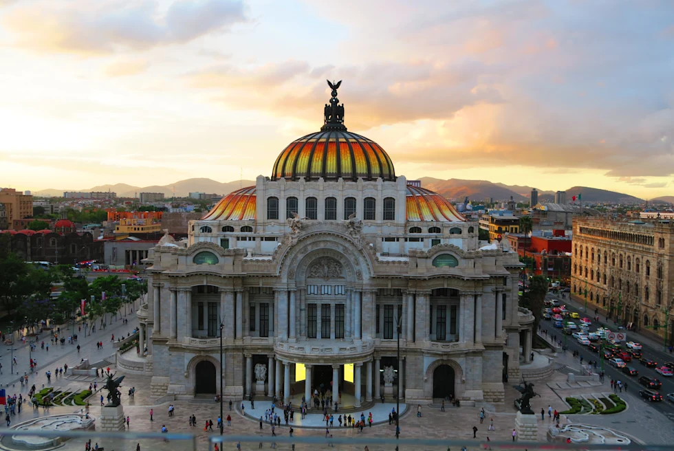 White building with dome roof during sunset