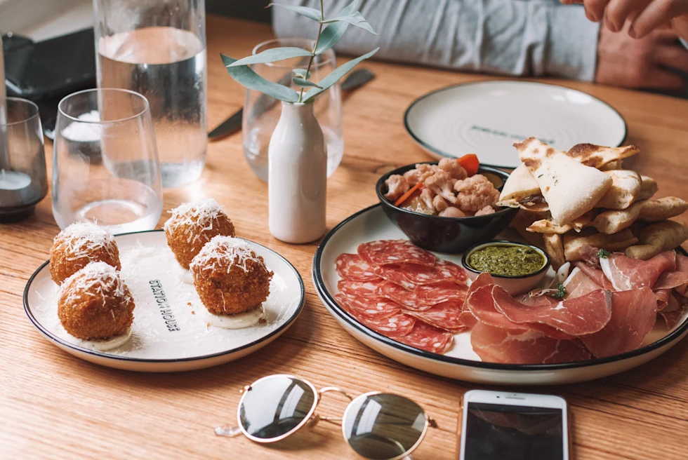 plates of food on a wooden table