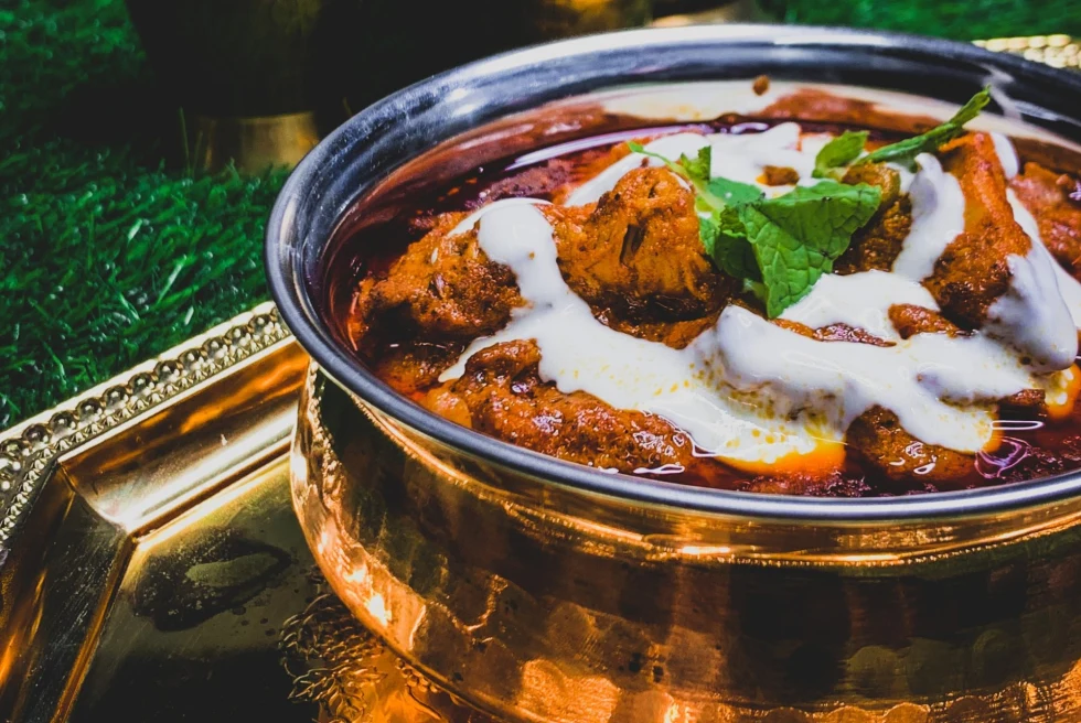 Indian food in a gold bowl