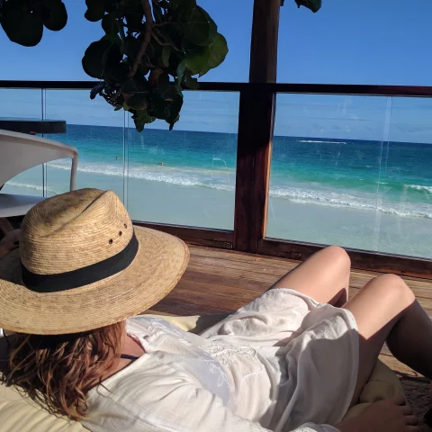 Lounging at a mezzanine hotel patio in Tulum.