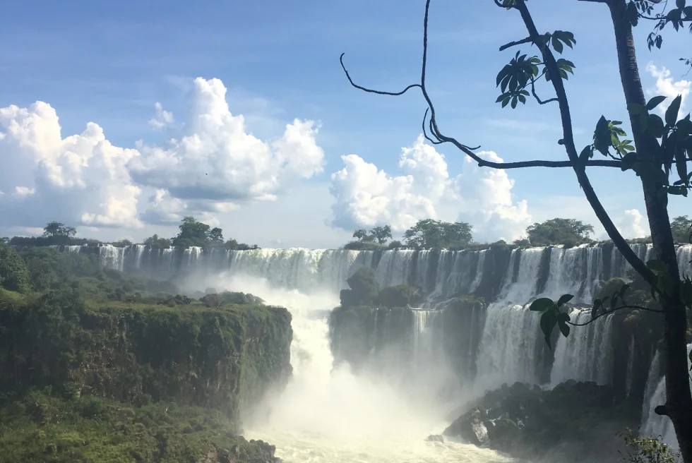 Iguazu Falls is nature's awe-inspiring masterpiece, a UNESCO-listed wonder where the Iguazu River cascades dramatically between Argentina and Brazil in a breathtaking display of water and mist.