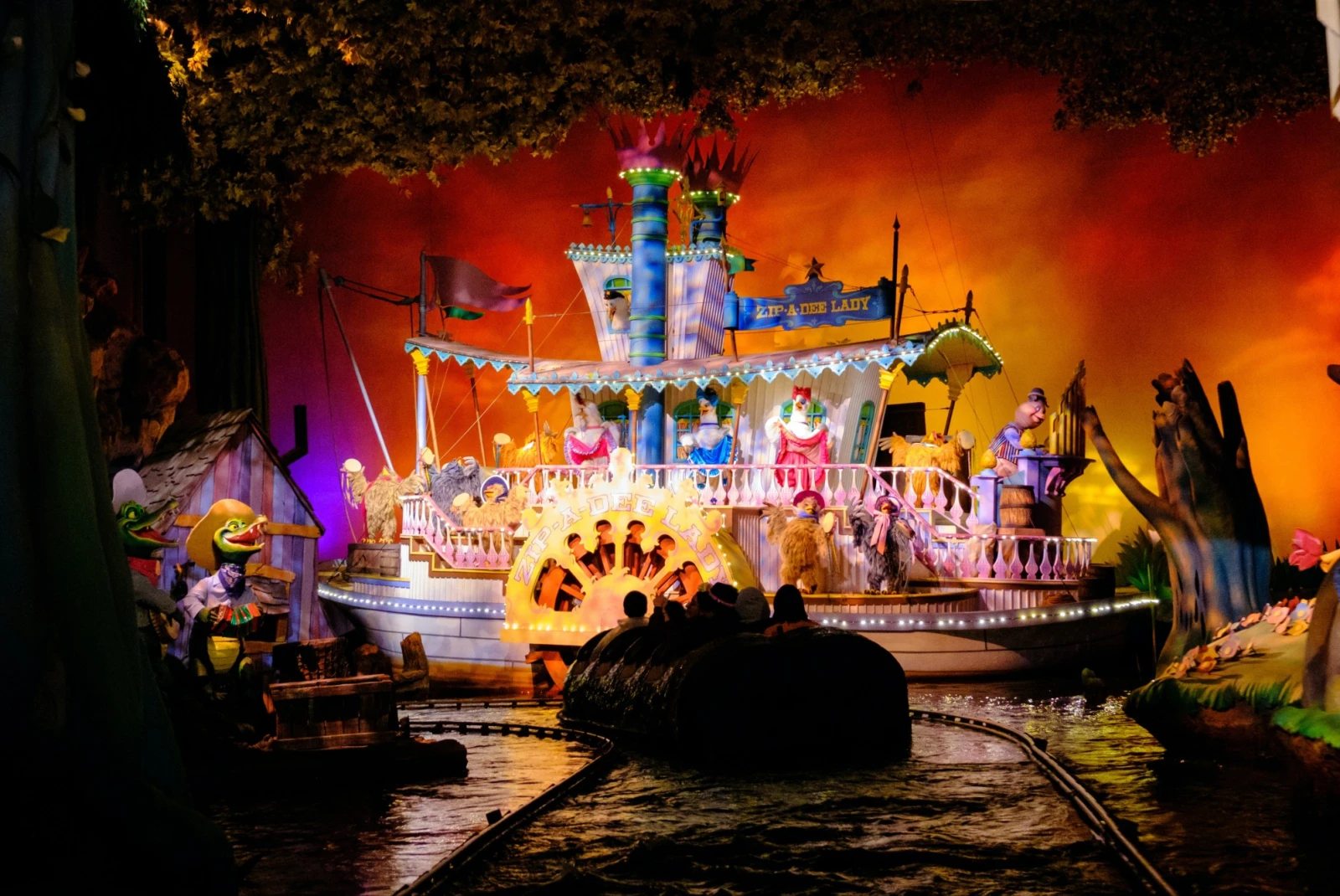 colorful stage boat inside an amusement park ride