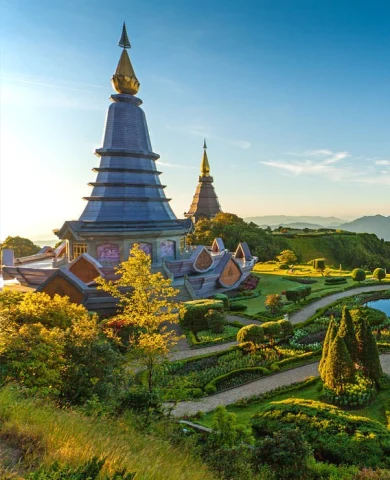 Aerial view of a castle surrounded by green fields in Chiang Mai
