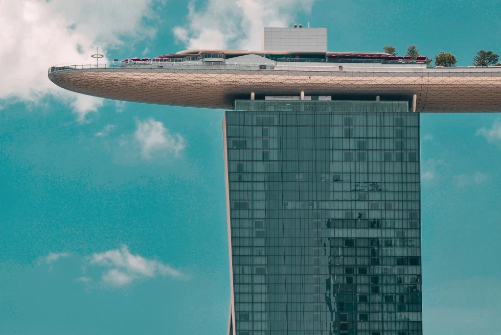 a flat rooftop restaurant at the top of a skyscraper with blue skies