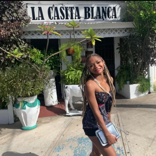 Travel Advisor Lorrin Davis in front of La Casita Vlanca