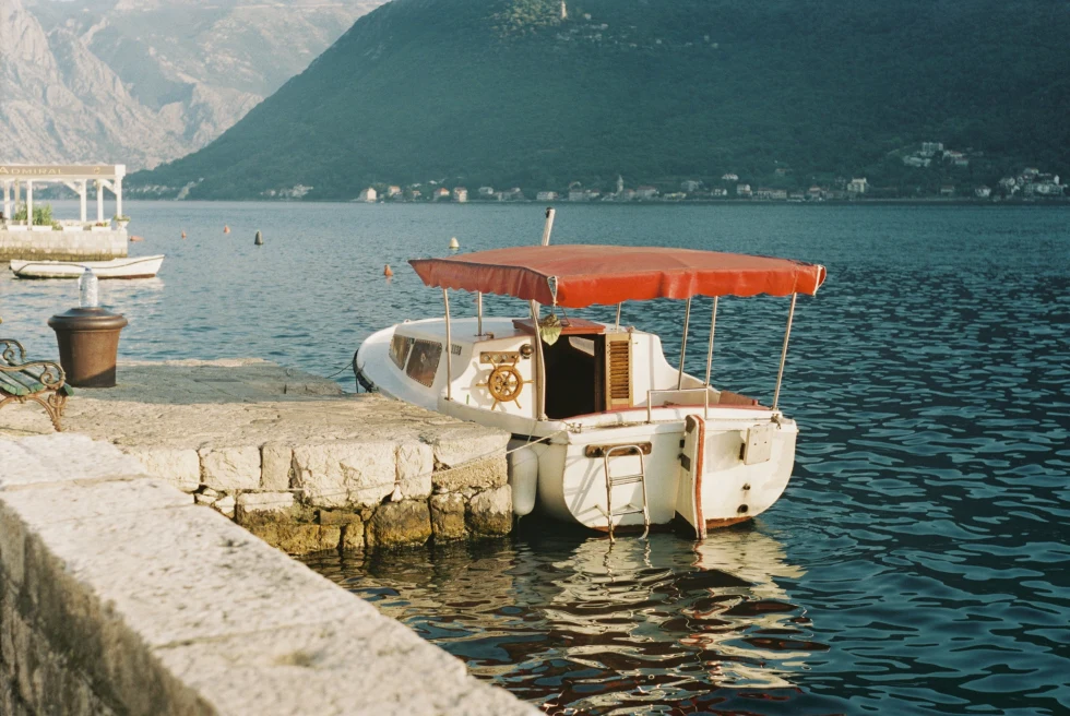 A small boat to tour Kotor Bay. 