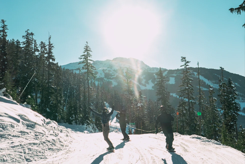 people skiing on snowy mountain during daytime