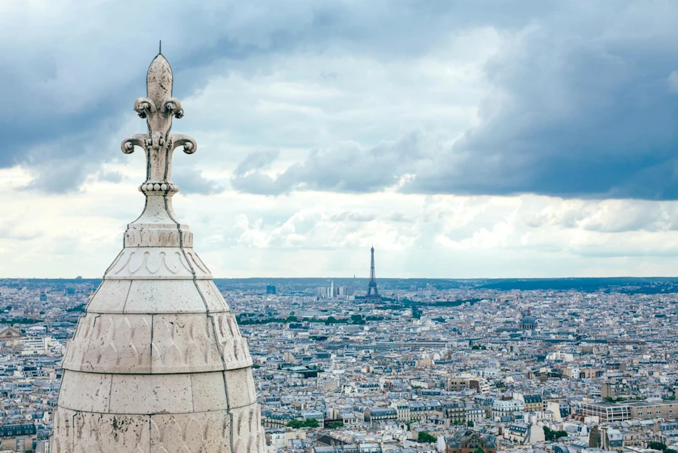 a view from above Paris with the Basilica steeple in the foreground