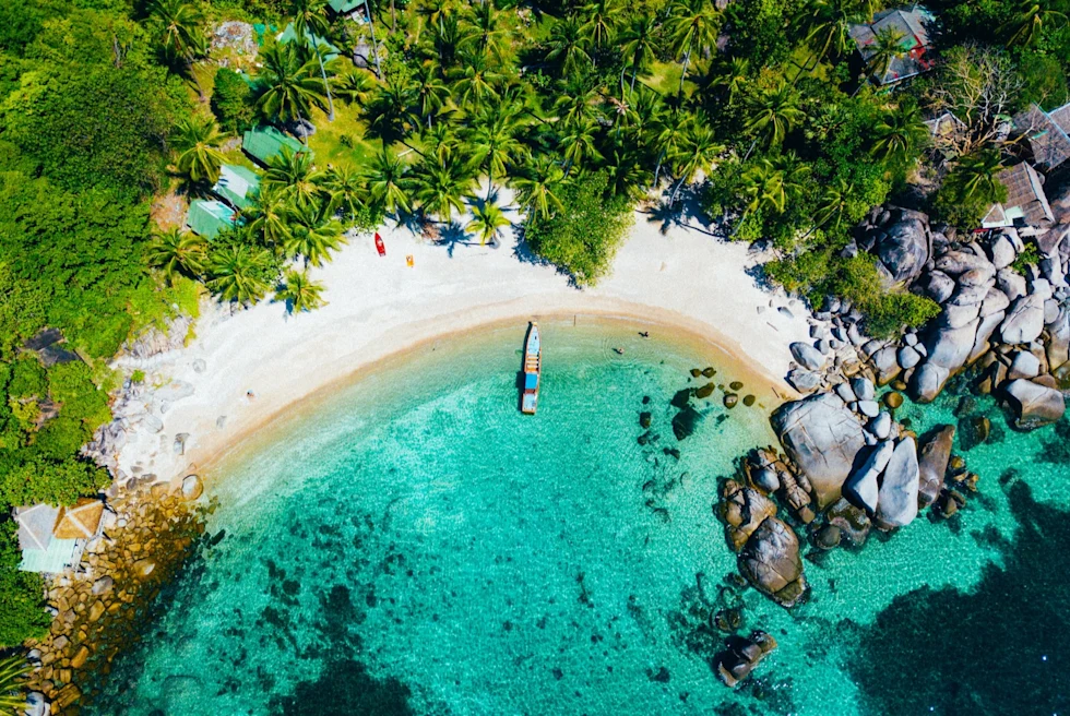 A boat on a deserted Thai island.