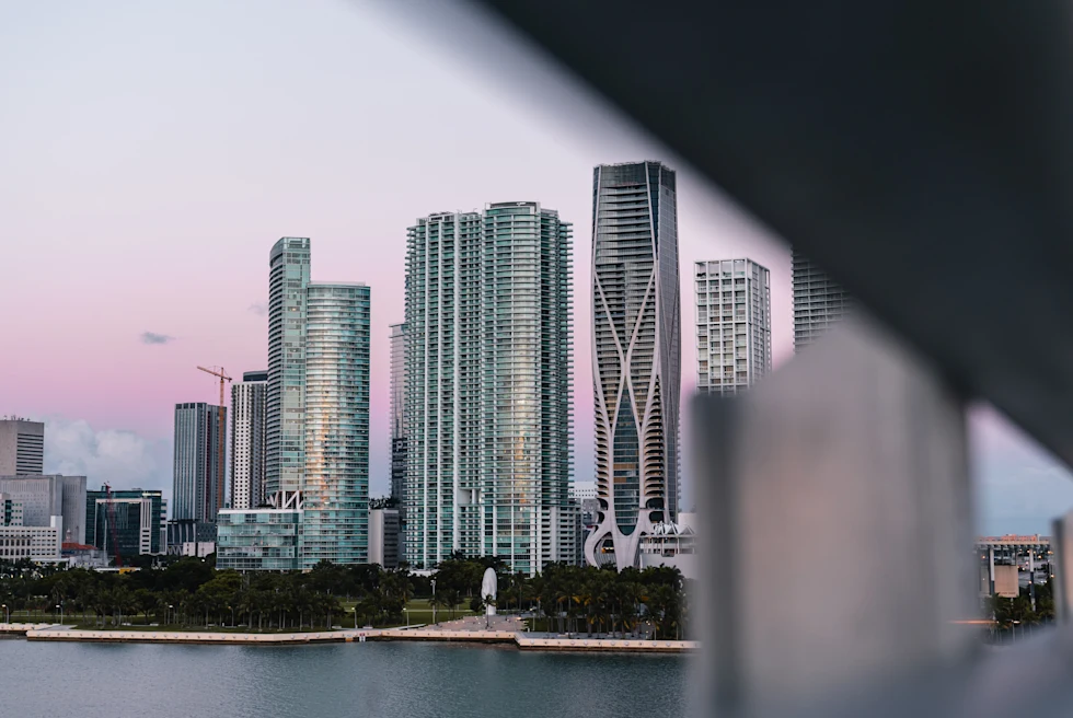 A distant view of huge buildings on seashore in the city