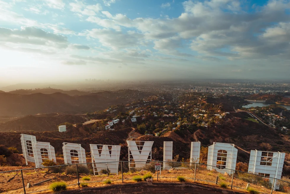 view from behind the Hollywood sign of the Hollywood hills on a hazy day