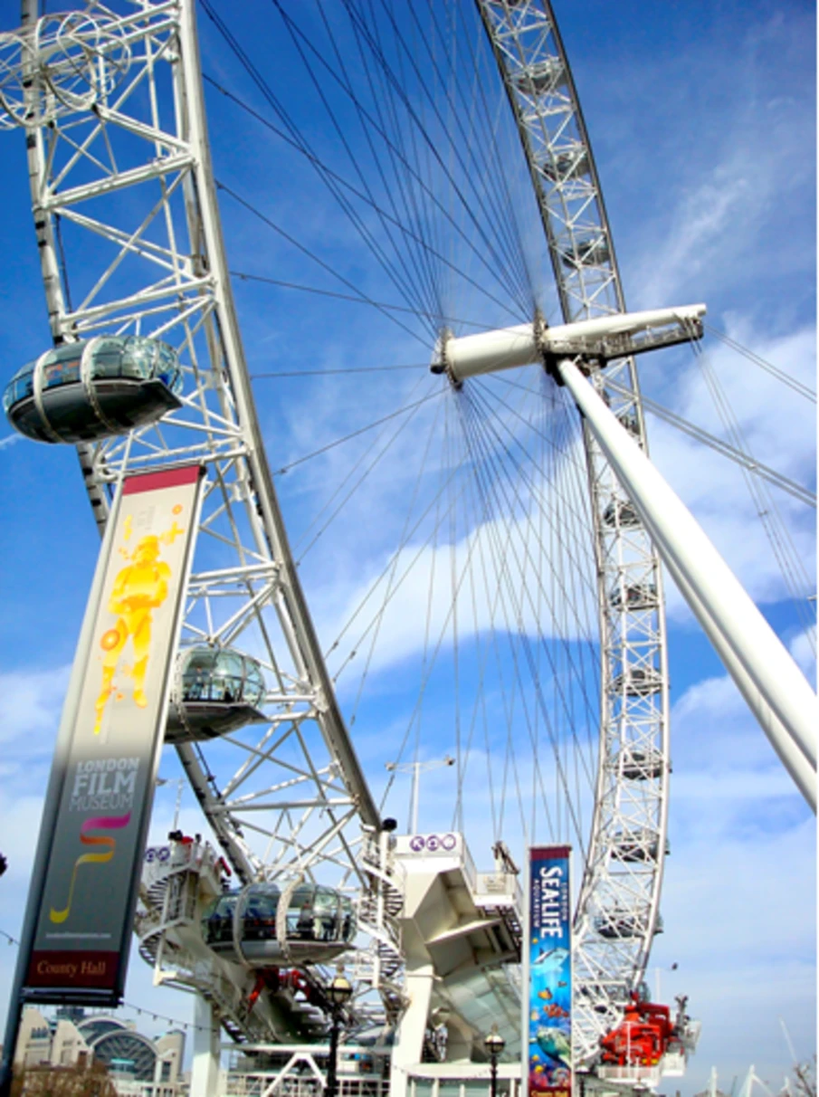 A low-angled Ferris wheel at daytime.