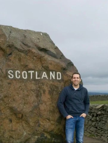 The advisor's souvenir photo on his Scottish road trip.