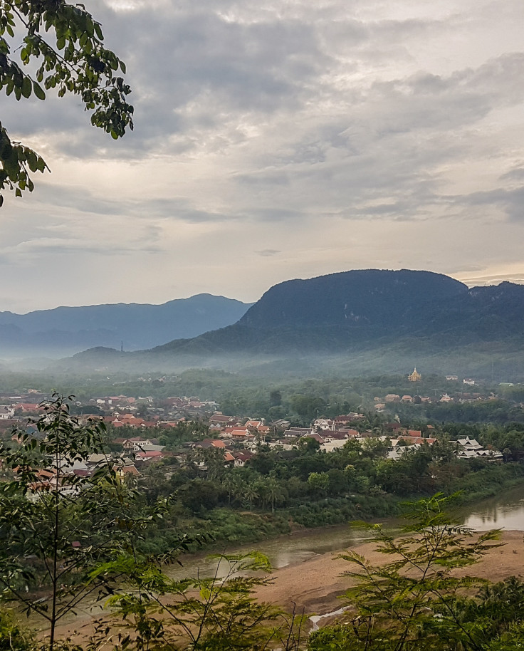 View of fog over the valley in Luang Prabang, Laos