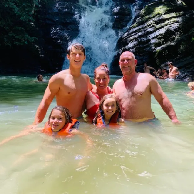Travel advisor posing with family