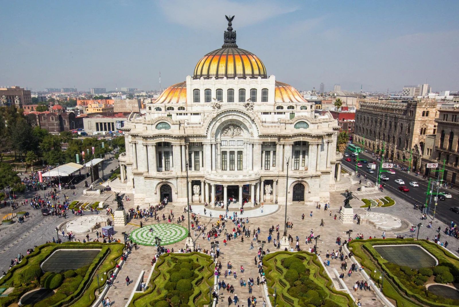 aerial view of a grand historic building with a gold dome