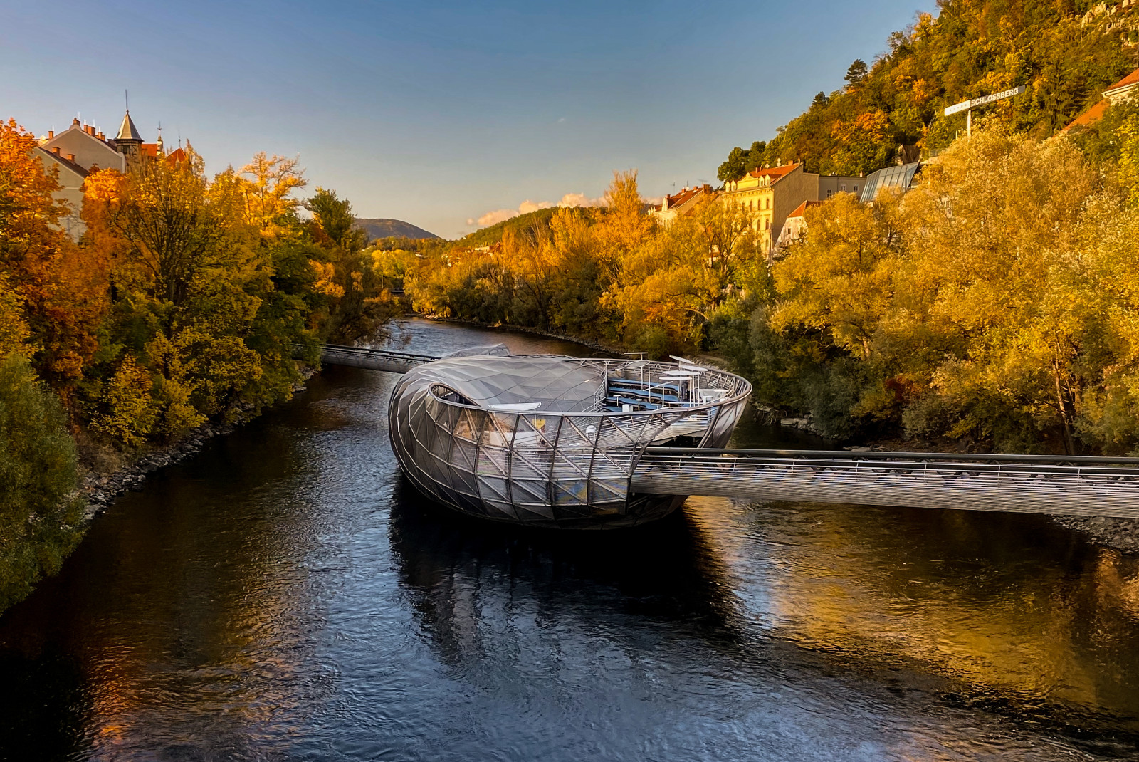 sculpture over river during daytime