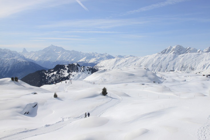 Skiing mountains covered in snow in Switzerland. 