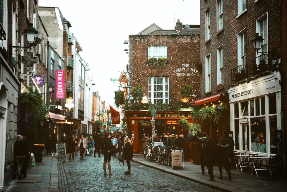 A busy street with pubs in Dublin, Ireland.