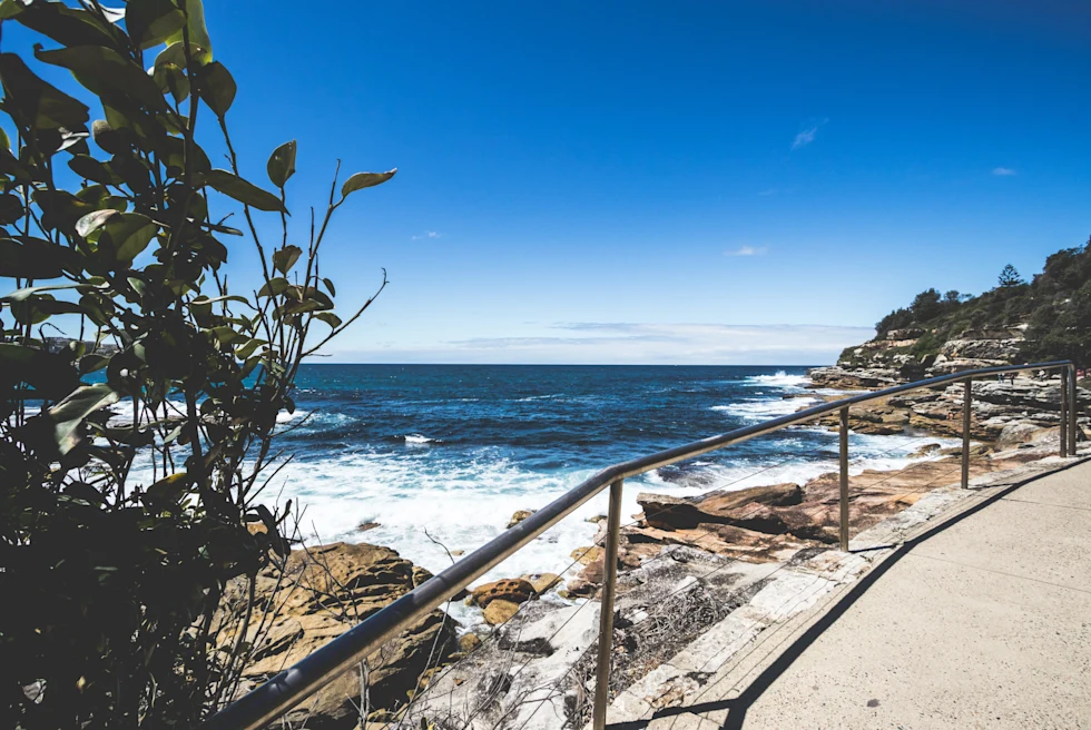 Bondi beach with a rugged coastline.