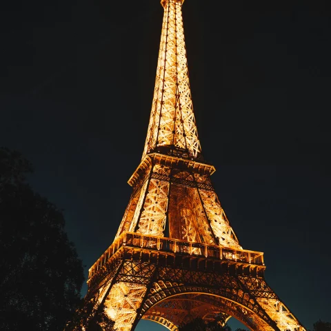 nighttime picture of a tower in Paris