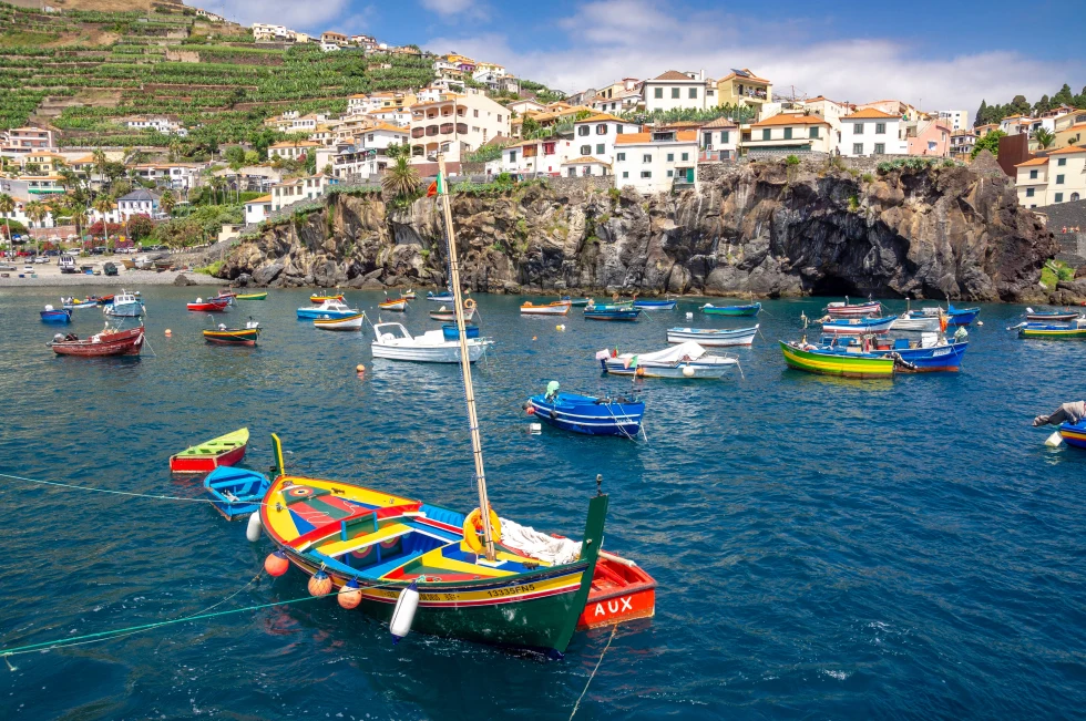 Madeira coast with boats. 