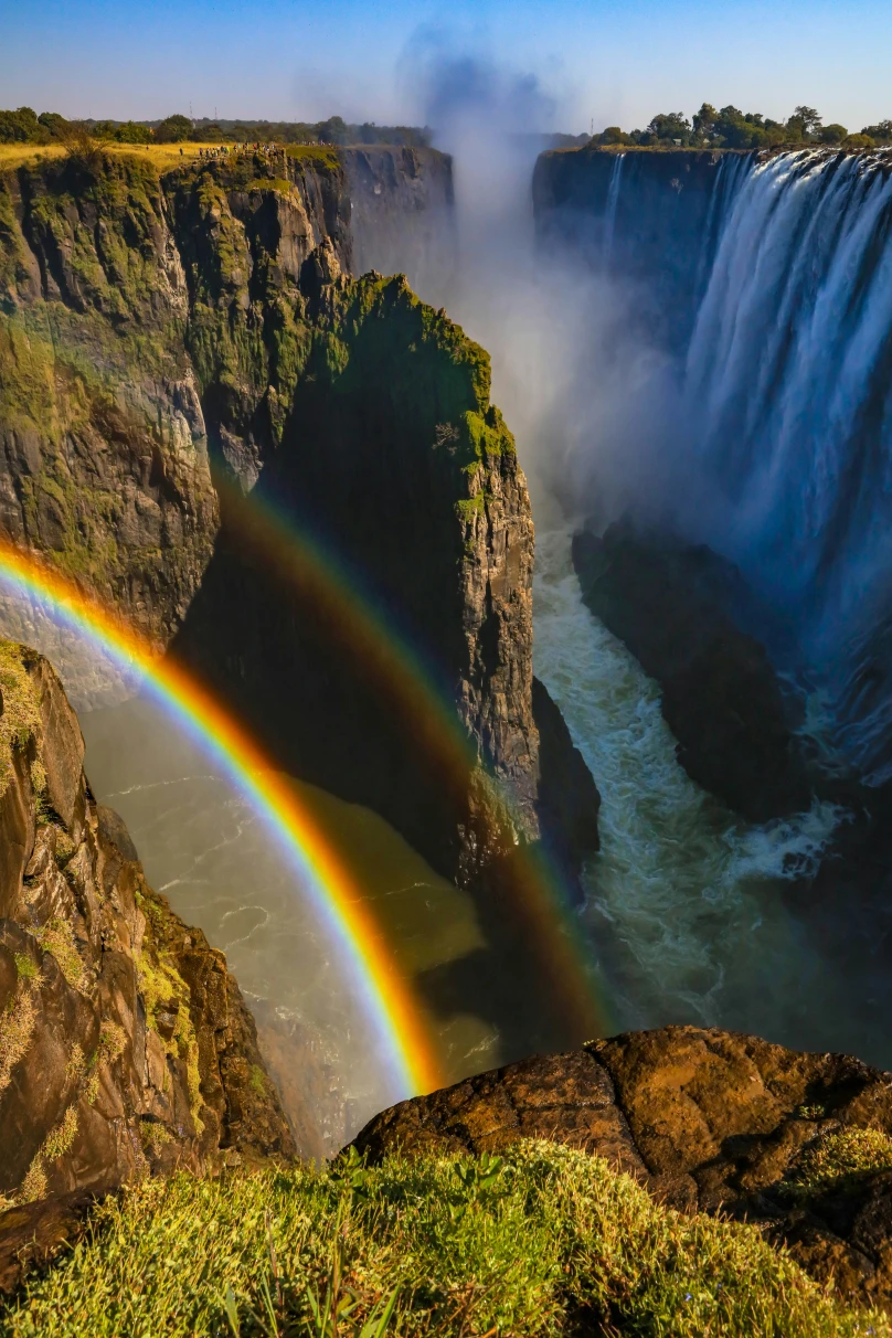 A beautiful view of a rainbow over Victoria Falls