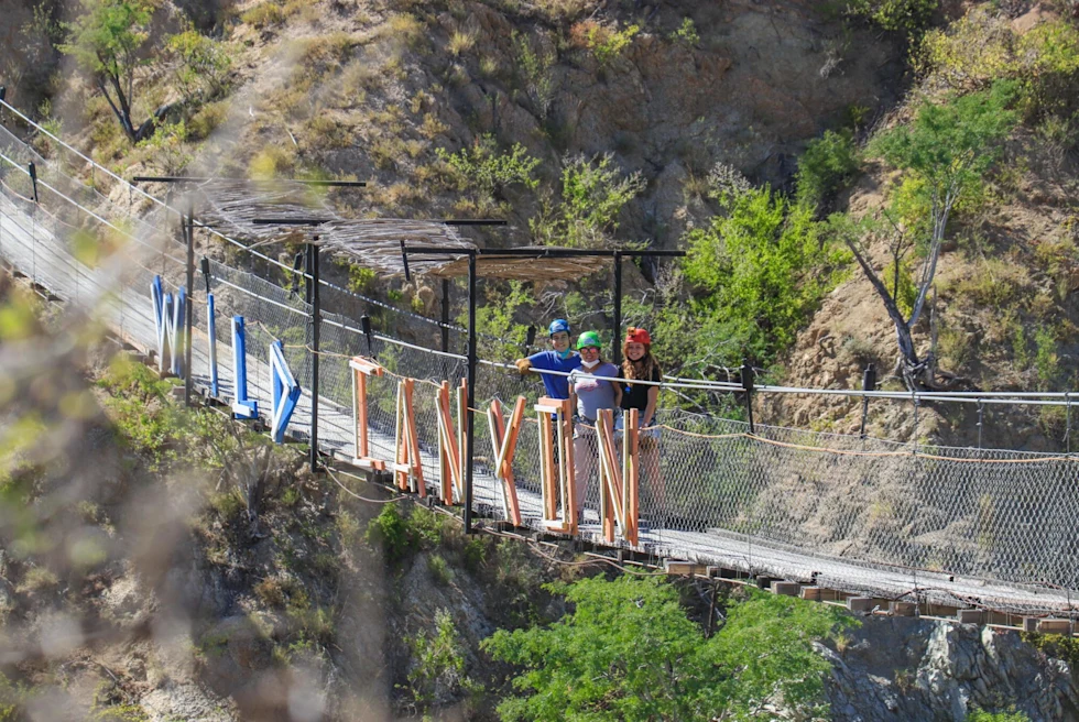 3 people on a transparent br