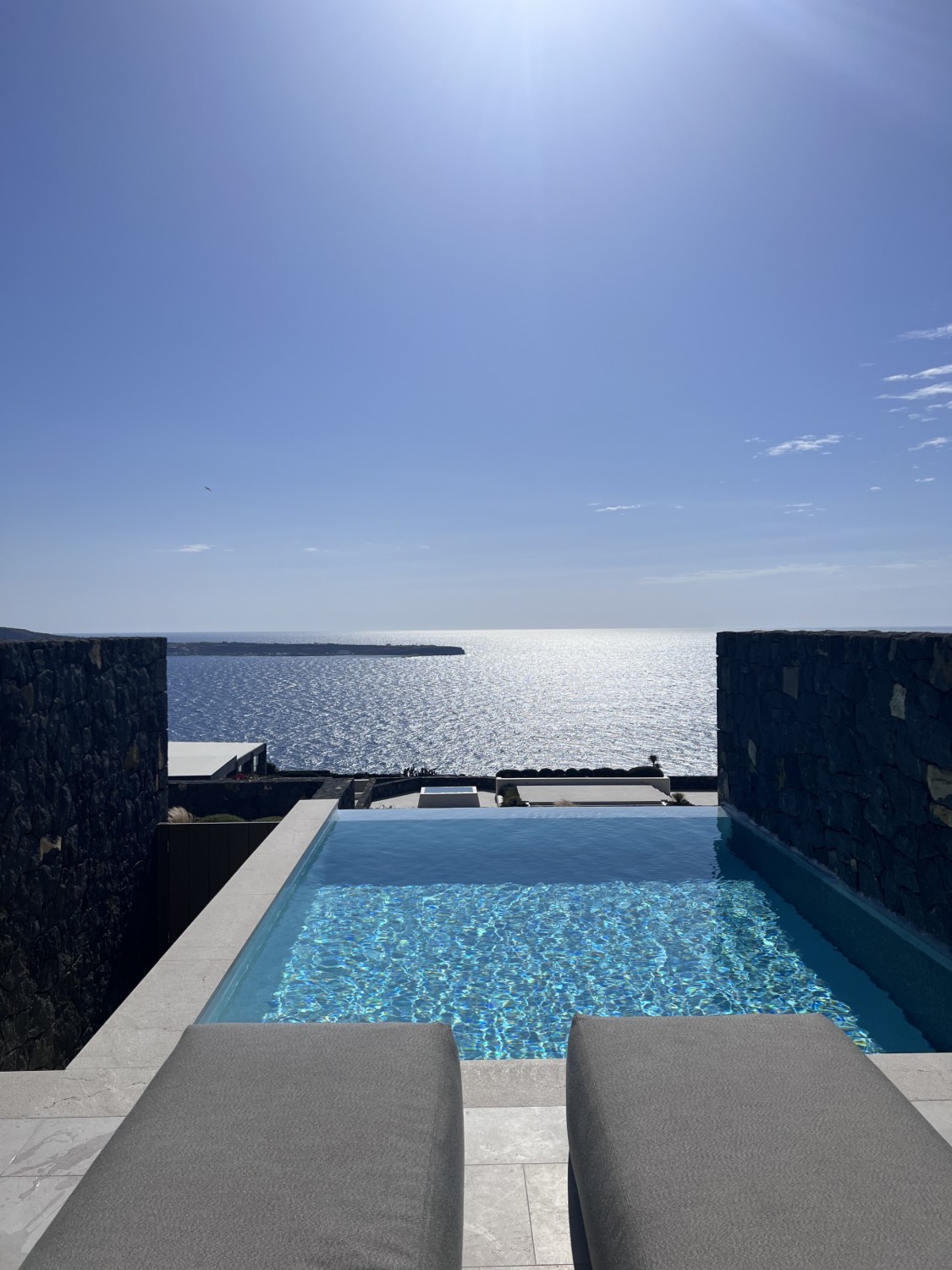 square infinity pool overlooking the ocean