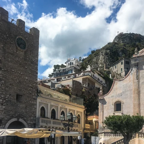 outdoor restaurant in a historic building in a hillside town