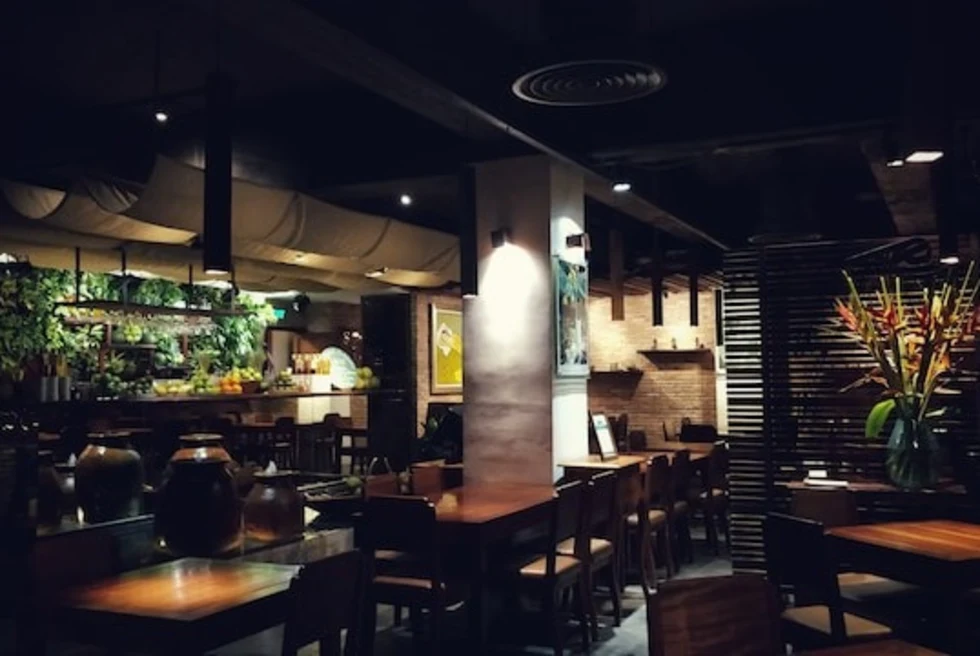 An inside shot of a restaurant at night.