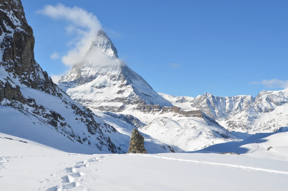 snow-capped mountain peak during daytime