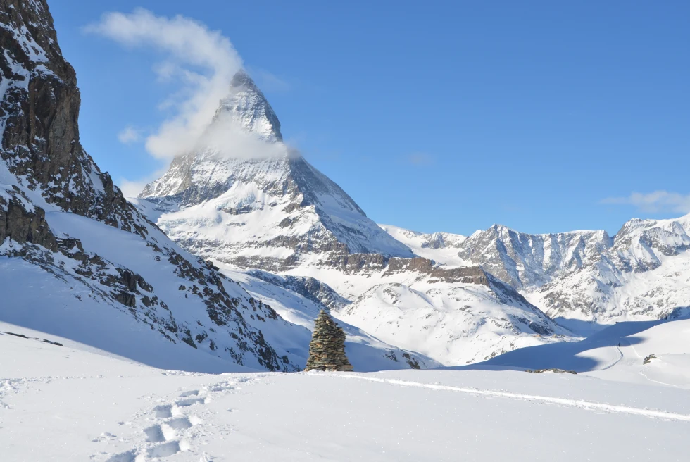 snow-capped mountain peak during daytime