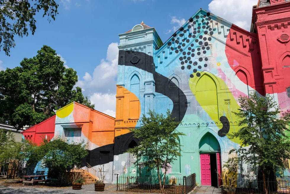 colorful mural on building with clear sky during daytime