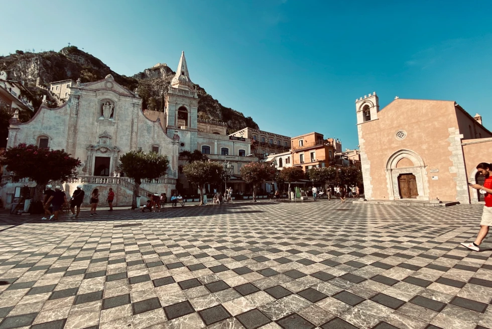 Marble tiles with a white building at the back