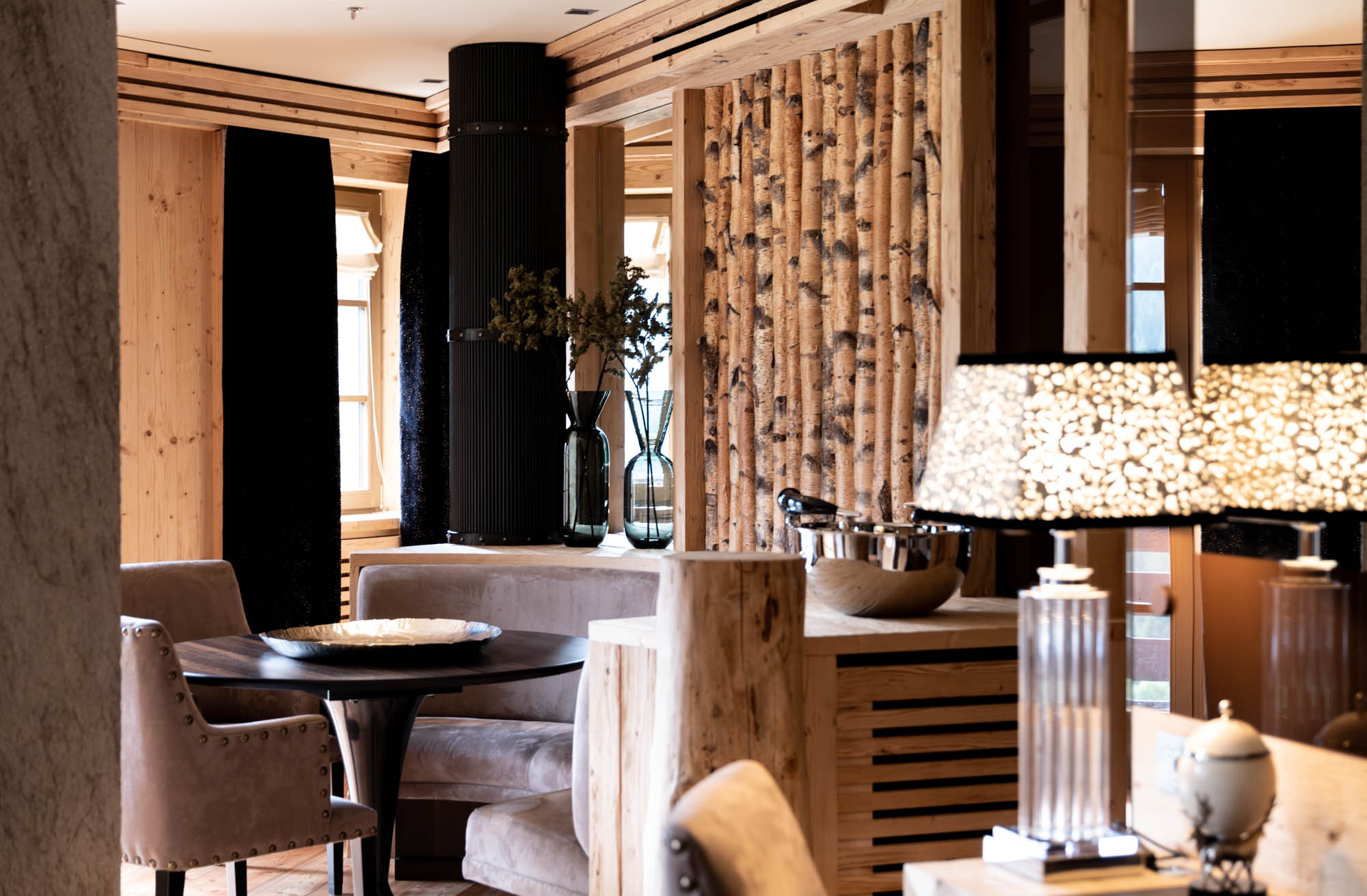 a round dining table in an alpine-chic room