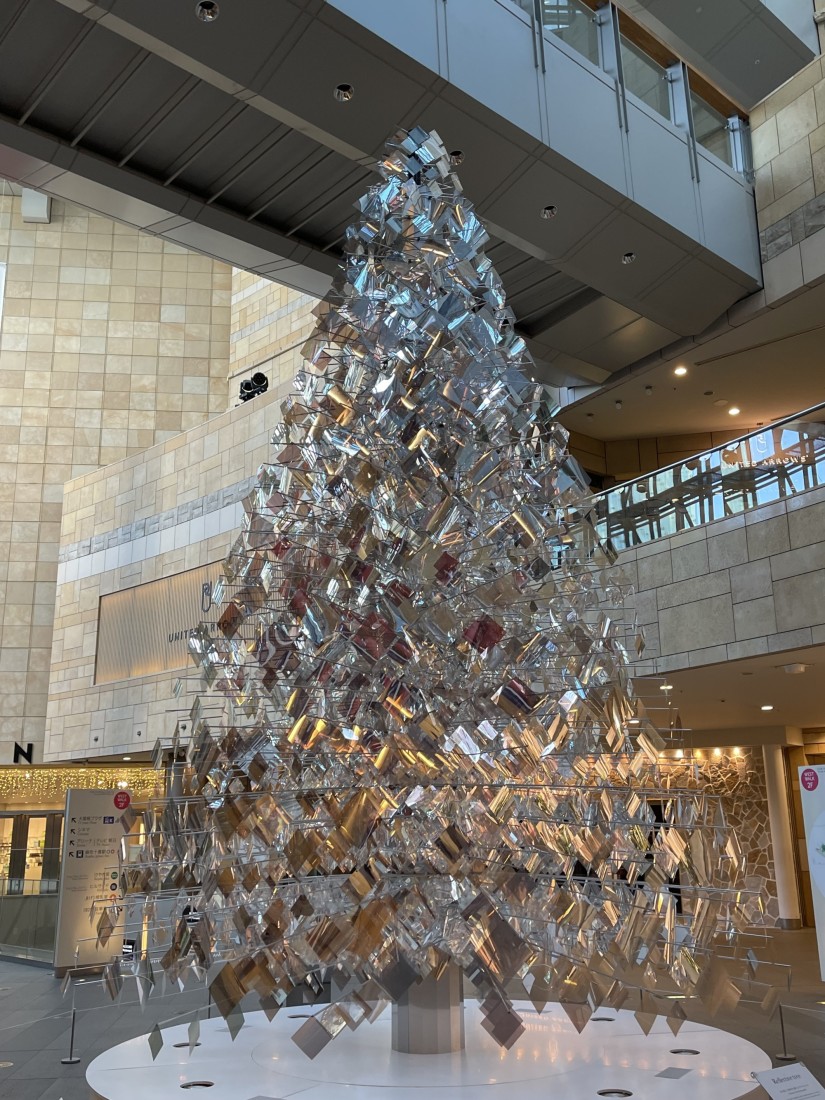 an indoor Christmas tree made out of ornaments