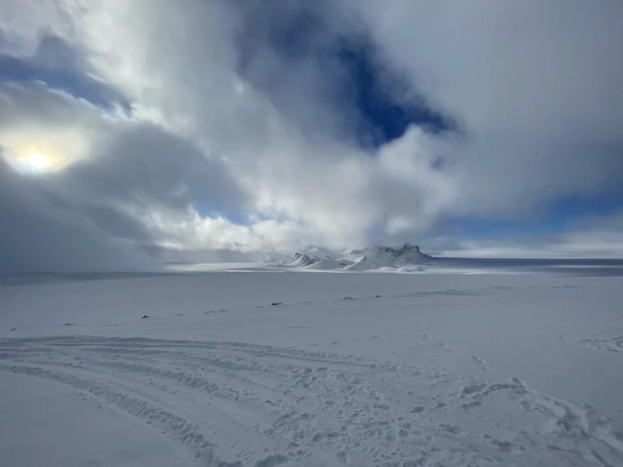 glacier erupts across vast snowy land