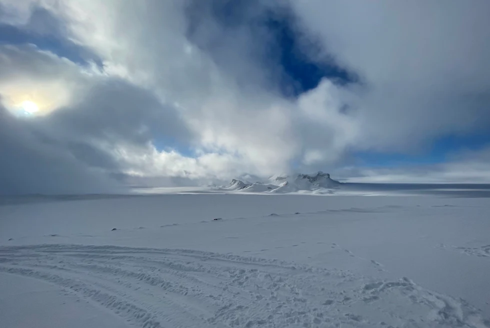 glacier erupts across vast snowy land