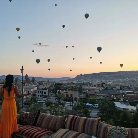 Hot air balloons in the air during sunset